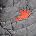 DSC_0031 Leap the Frog appears on nearly every piece of SRAM road apparel, including this grey puffy jacket